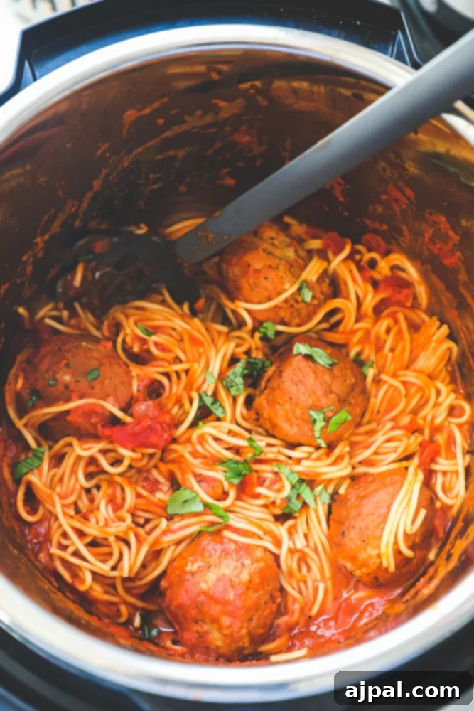 Picture of spaghetti and meatballs in instant pot, a quick and easy family dinner