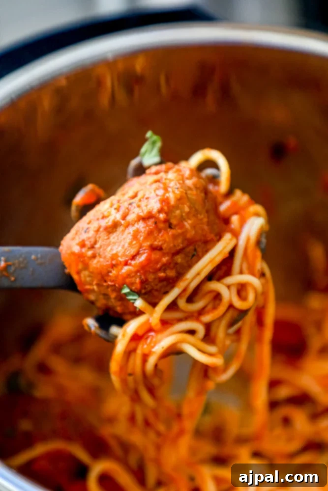 Picture of a large serving of Instant Pot spaghetti and meatballs