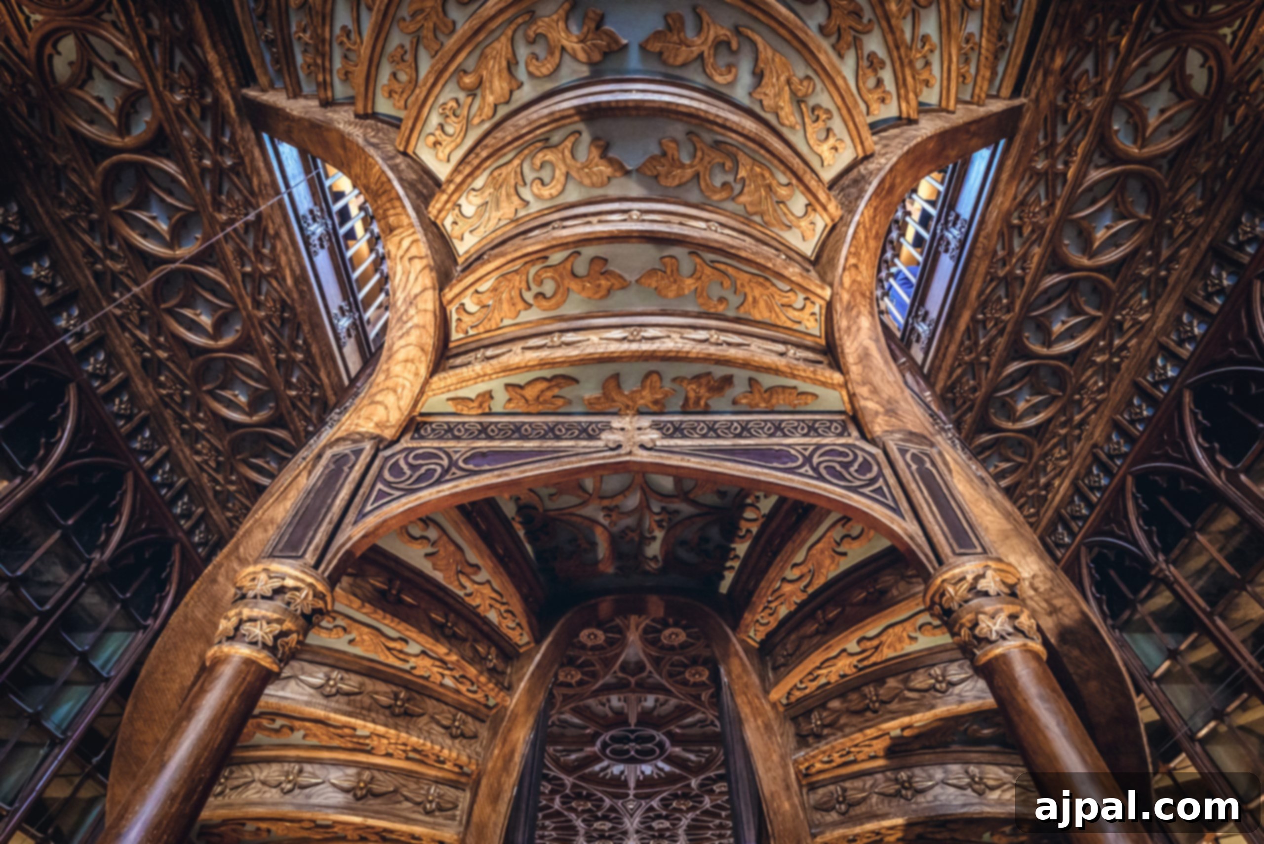 Crafting the Perfect Port and Tonic 12 The grand, ornate staircase and intricate interior of Livraria Lello Bookstore in Porto, Portugal, widely regarded as one of the most beautiful bookstores globally.