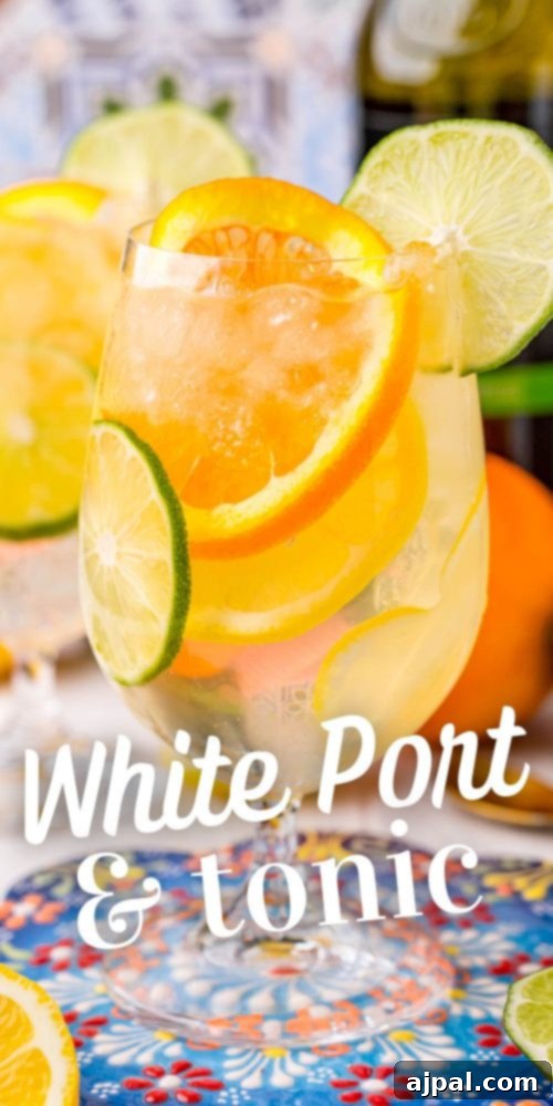 Crafting the Perfect Port and Tonic 25 A vibrant Port and Tonic cocktail, showcasing its refreshing appeal with citrus garnishes in a wine goblet.