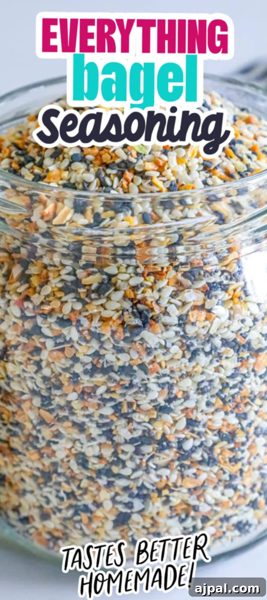 Ultimate Everything Bagel Seasoning Blend 6 A jar of sesame seeds, poppy seeds, and spices, showcasing the versatility of everything bagel seasoning.