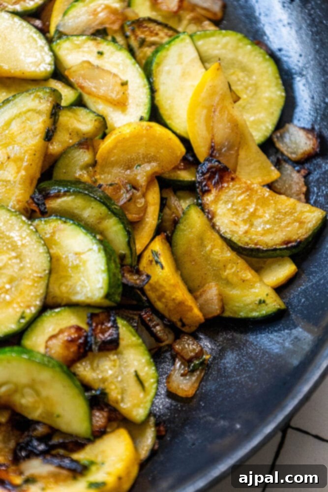 A sautéed side dish of zucchini and onions.