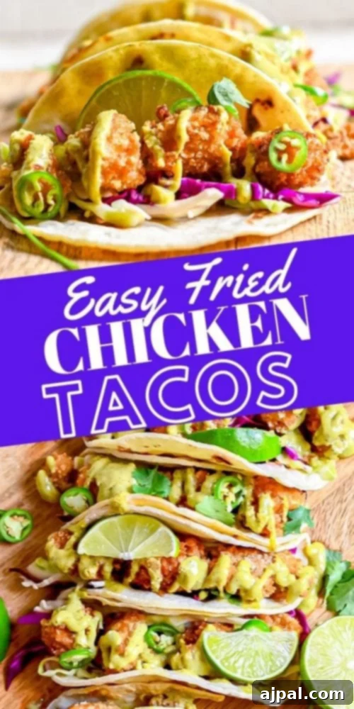 Crispy Chicken Tacos 11 A beautifully presented serving of delicious fried chicken tacos on a rustic cutting board, highlighting their crisp texture and vibrant fillings, ready for enjoyment.