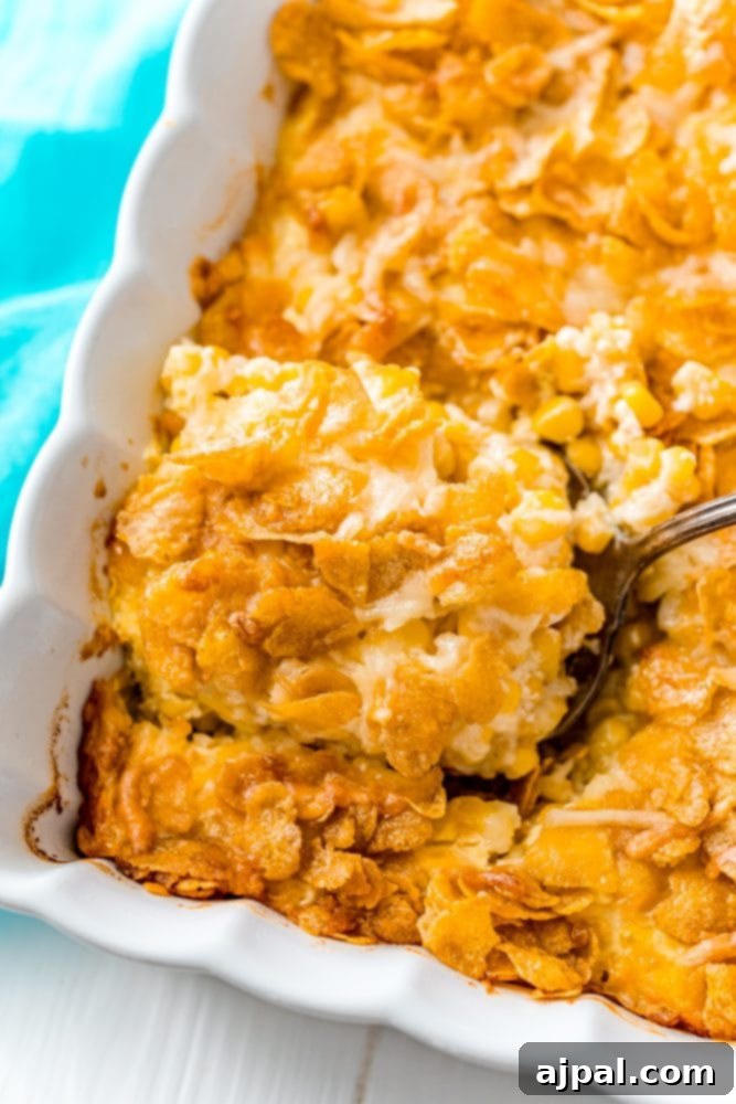 Golden Scalloped Corn Bake 4 scalloped corn with cornflakes in a white casserole dish
