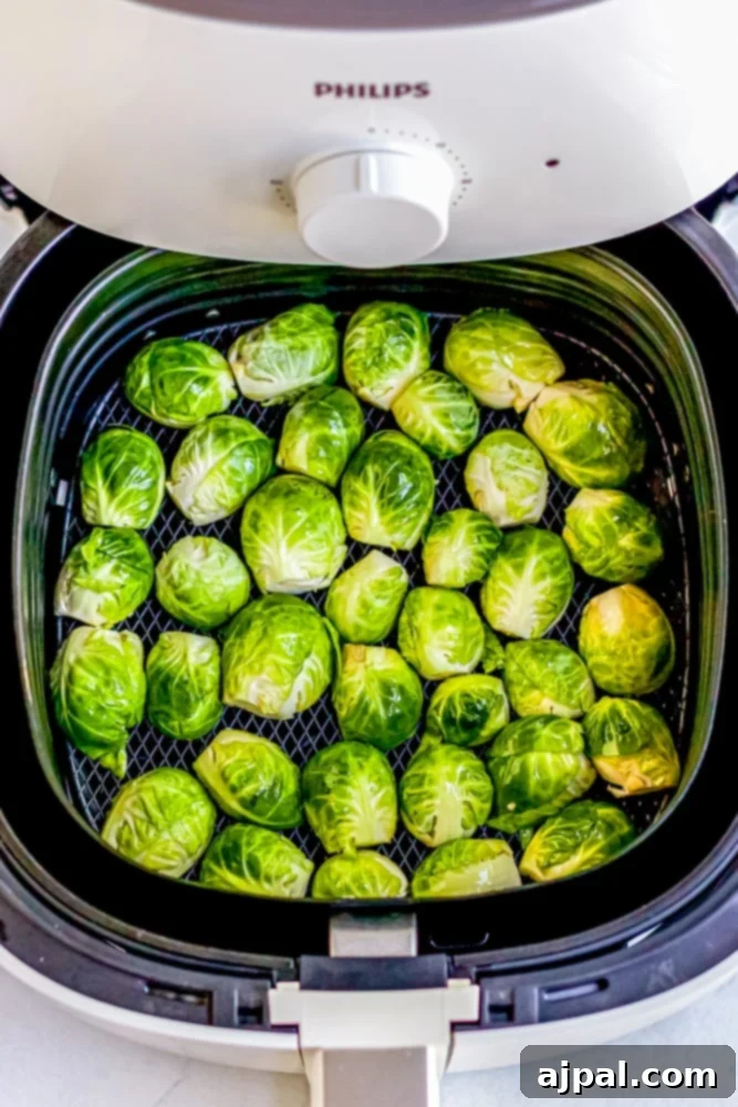 brussel sprouts in an air fryer basket
