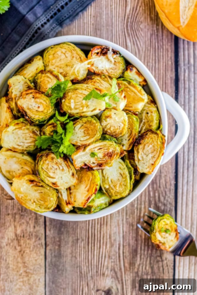 Air fried brussels sprouts in a bowl on a wood table