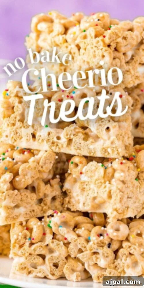A visually appealing image of No Bake Cheerios treats, artfully arranged on a white plate, exuding a sense of cheesy goodness.