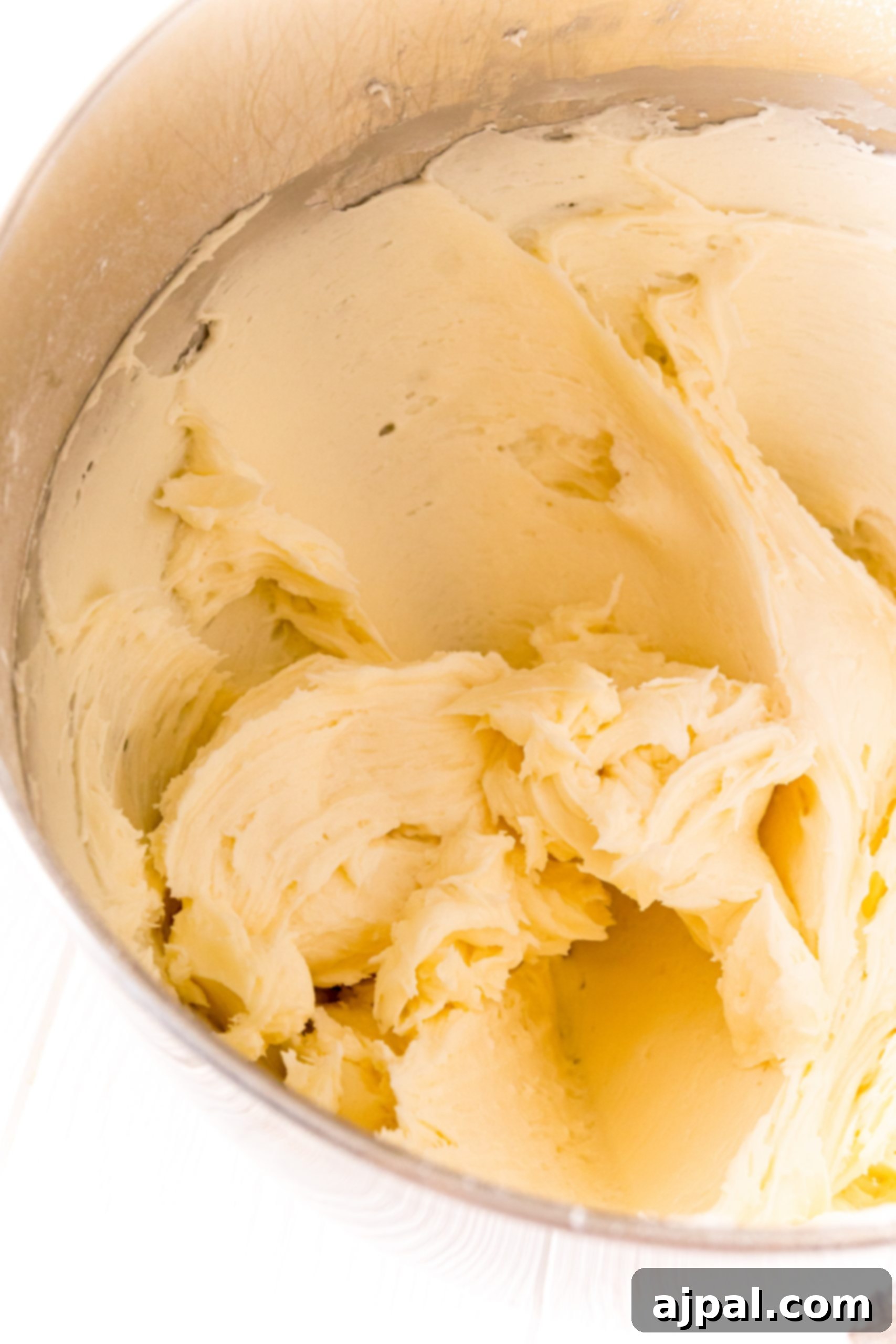Creamed butter and sugar showing a light, fluffy texture.