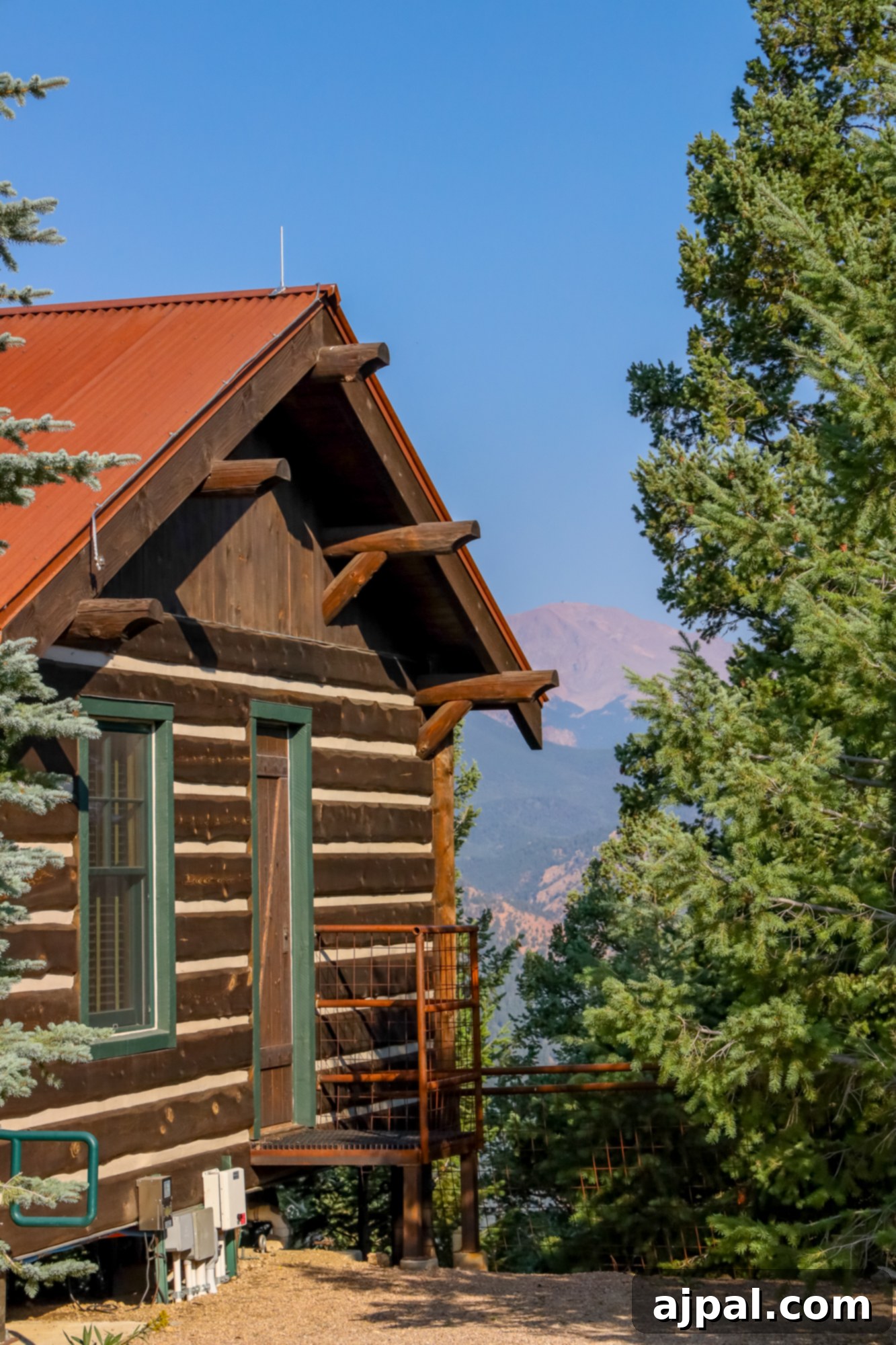 A charming rustic cabin at The Broadmoor Cloud Camp, offering a serene escape.
