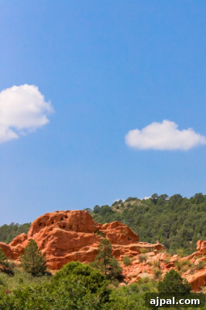 Scenic view of a bright blue sky with fluffy white clouds over Garden of the Gods.
