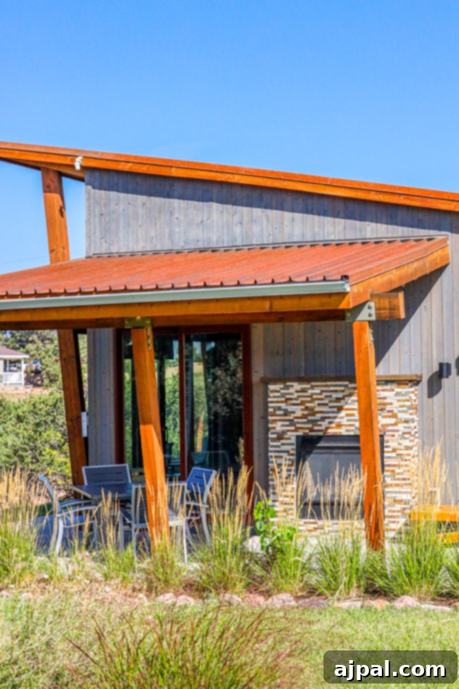 A cozy cabin at Echo Canyon Campground featuring a spacious patio and fire pit.