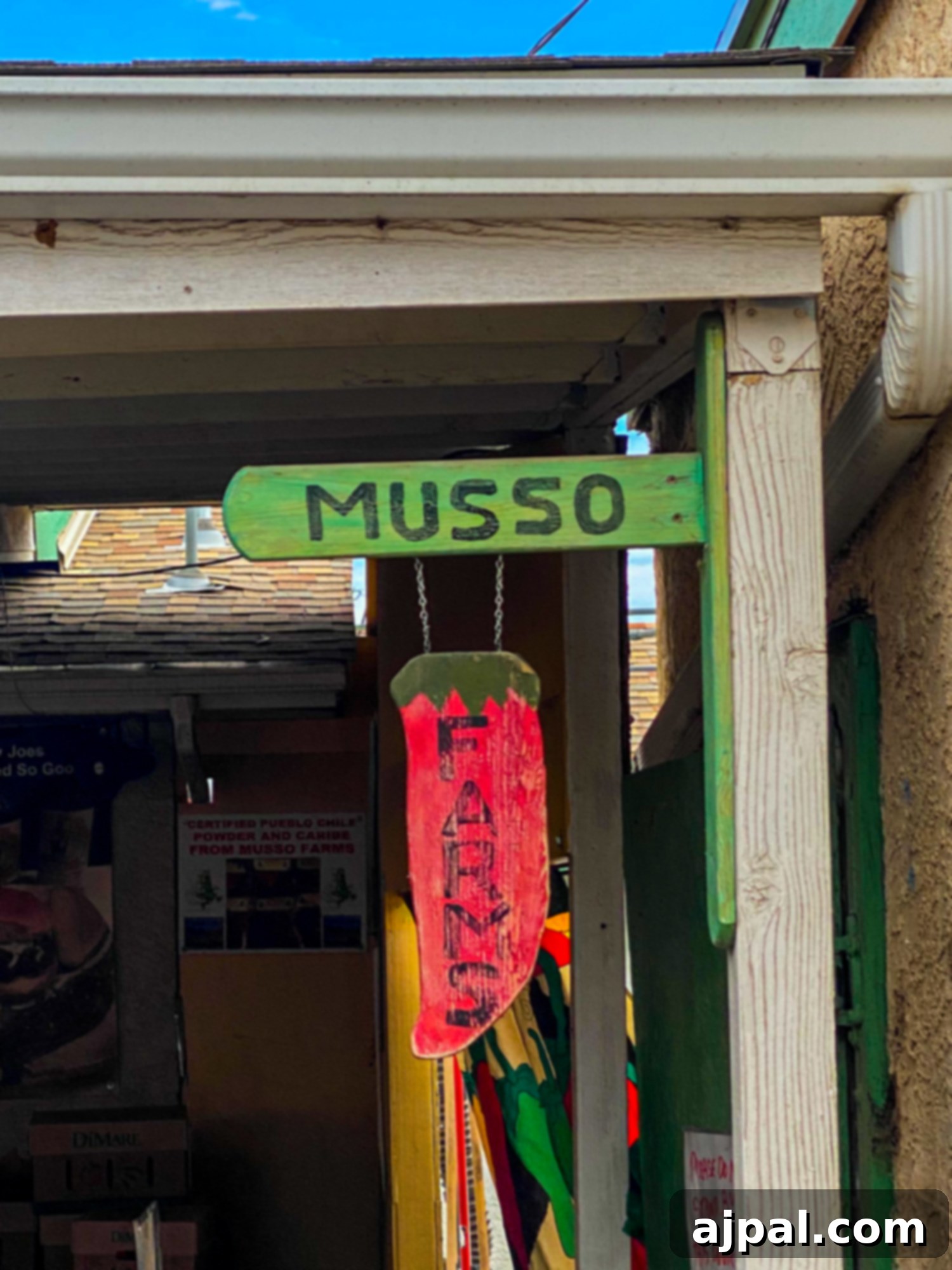 The charming Musso Farms sign, a landmark for fresh produce in Southern Colorado.