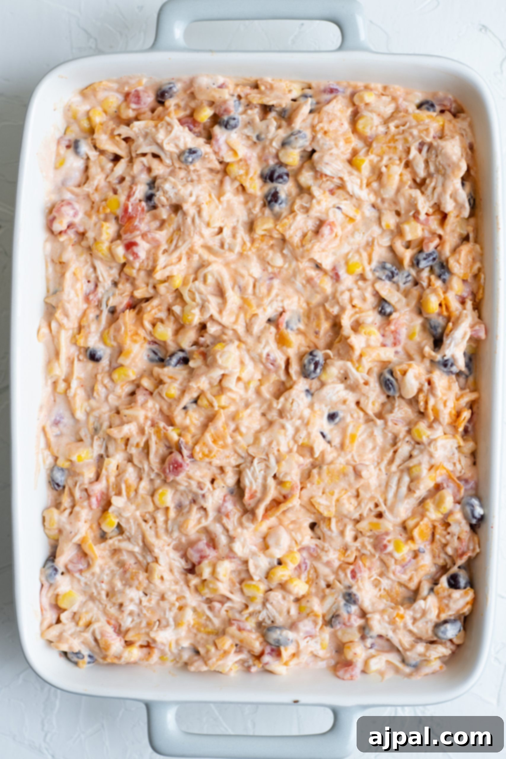 Crunchy Doritos Chicken Casserole 13 A chicken casserole with corn and Doritos.