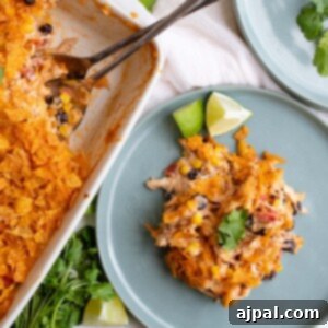 A plate of Easy Doritos Chicken Casserole with limes.