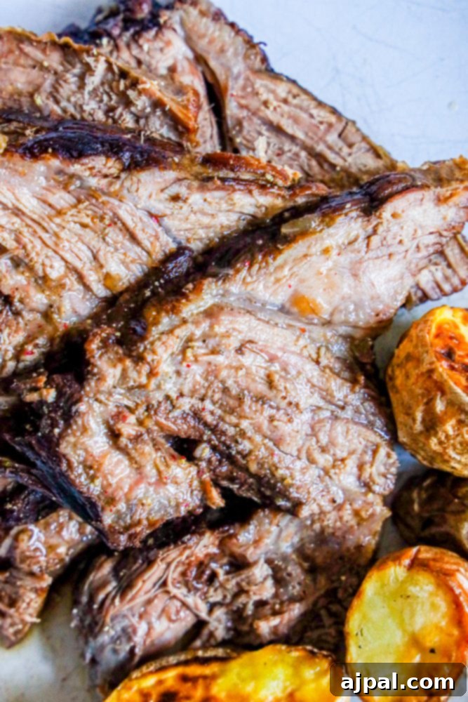 Fall-Apart Tender Pot Roast 6 Plates of perfectly sliced pot roast served with crispy baked potatoes, ready to enjoy.