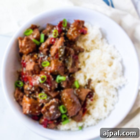 A bowl of rice with Korean beef and peppers, cooked in Instant Pot.
