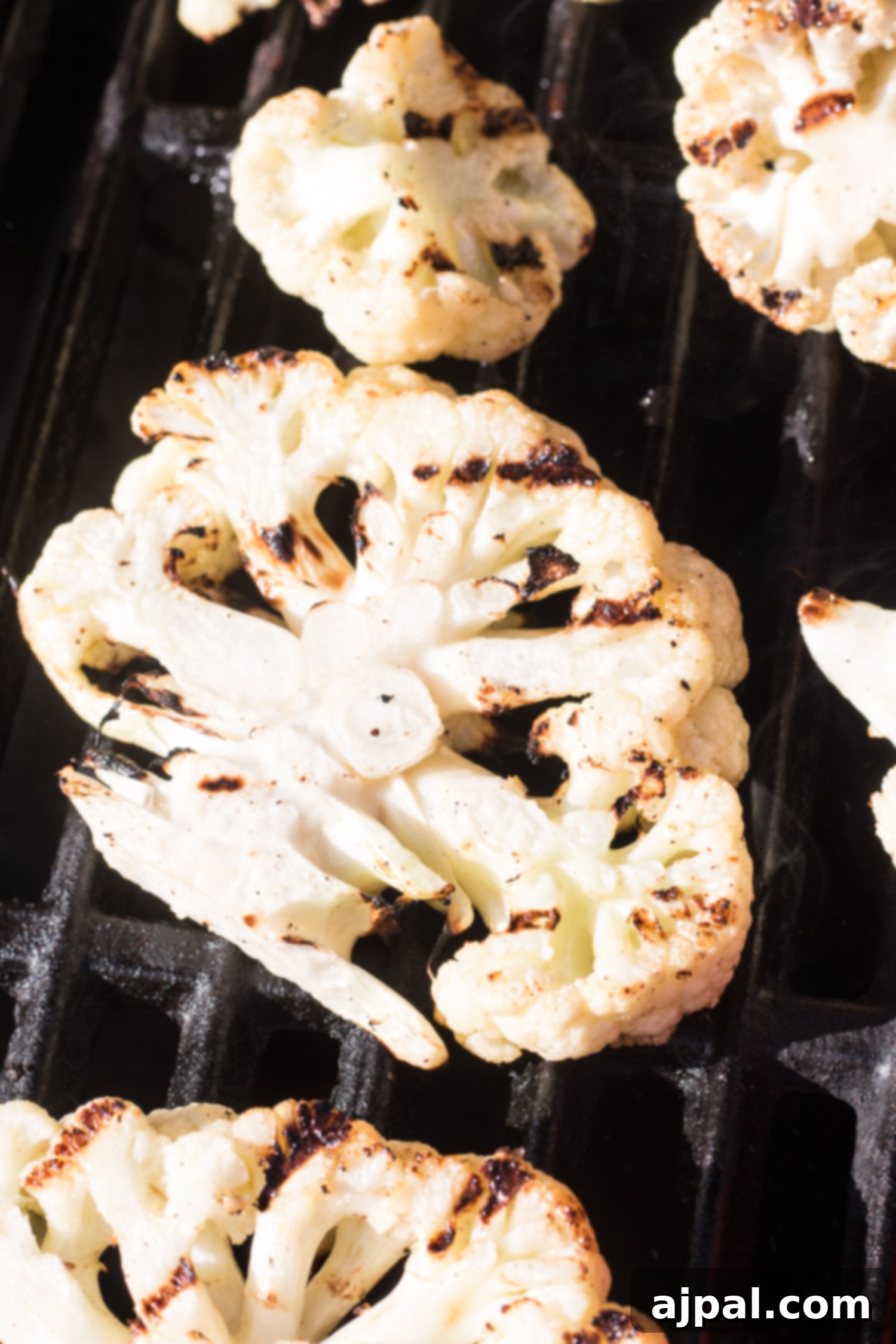 Effortless Cauliflower Steaks with Tangy Red Pepper Sauce 13 Succulent grilled cauliflower served with a generous dollop of flavorful red pepper sauce.
