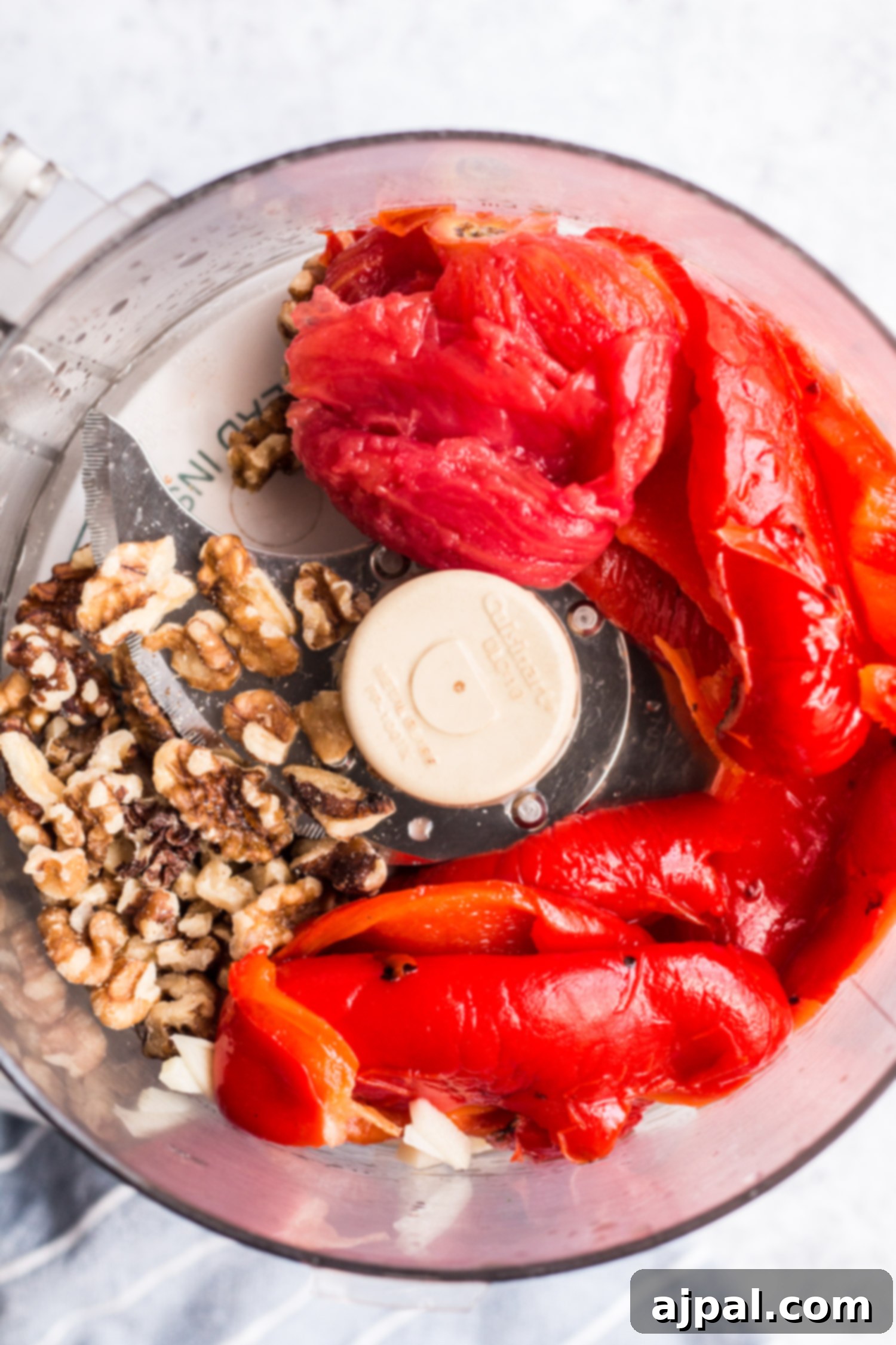Effortless Cauliflower Steaks with Tangy Red Pepper Sauce 6 Fresh ingredients laid out for making the easy cauliflower steaks with red pepper sauce.