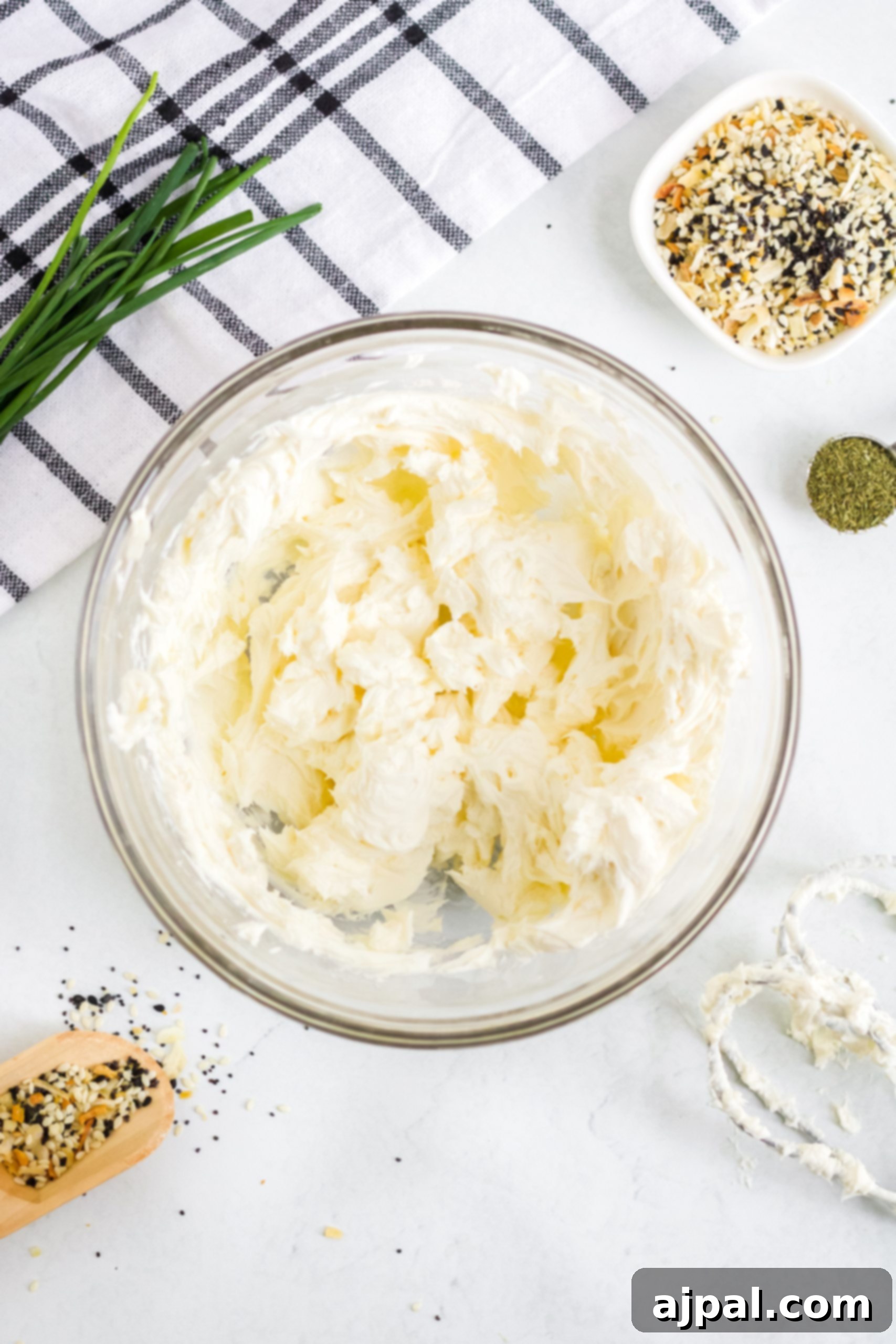 Savory Keto Everything Bagel Fat Bomb 5 A keto fat bomb, everything bagel fat bomb featuring cream cheese with herbs and spices on a white background.
