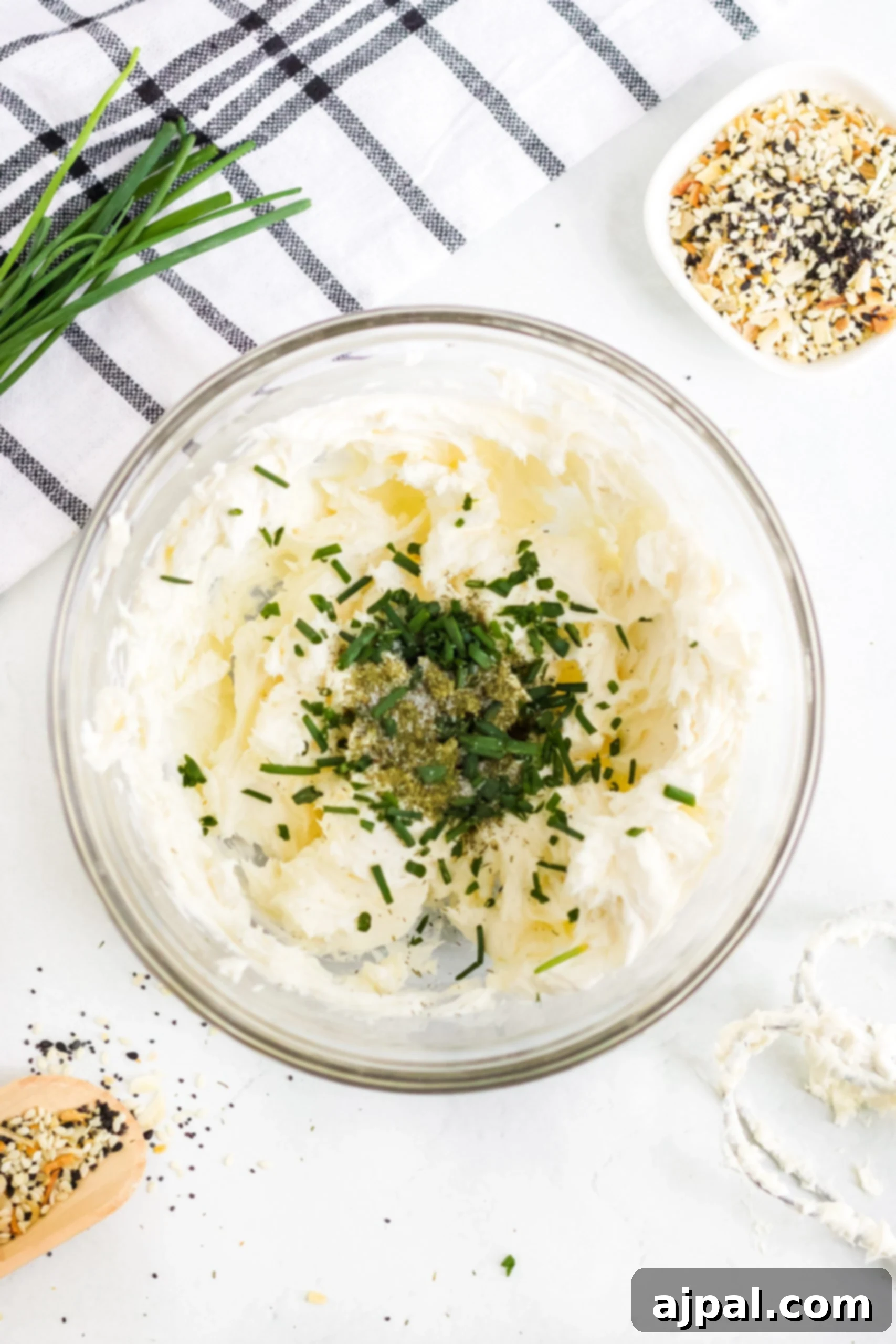 Savory Keto Everything Bagel Fat Bomb 6 A keto fat bomb featuring sour cream and chives on a white background.
