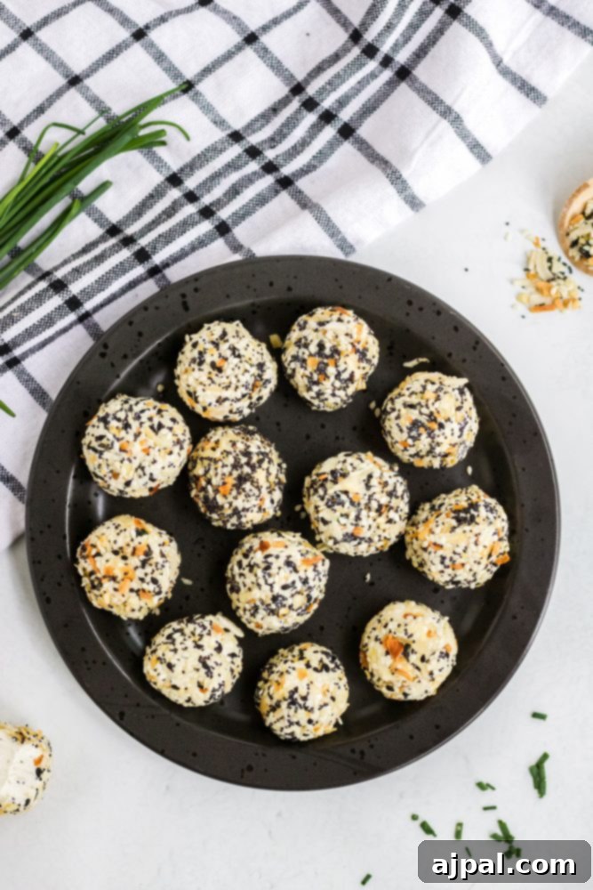 Savory Keto Everything Bagel Fat Bomb 10 picture of fat bombs in everything bagel seasoning on a plate