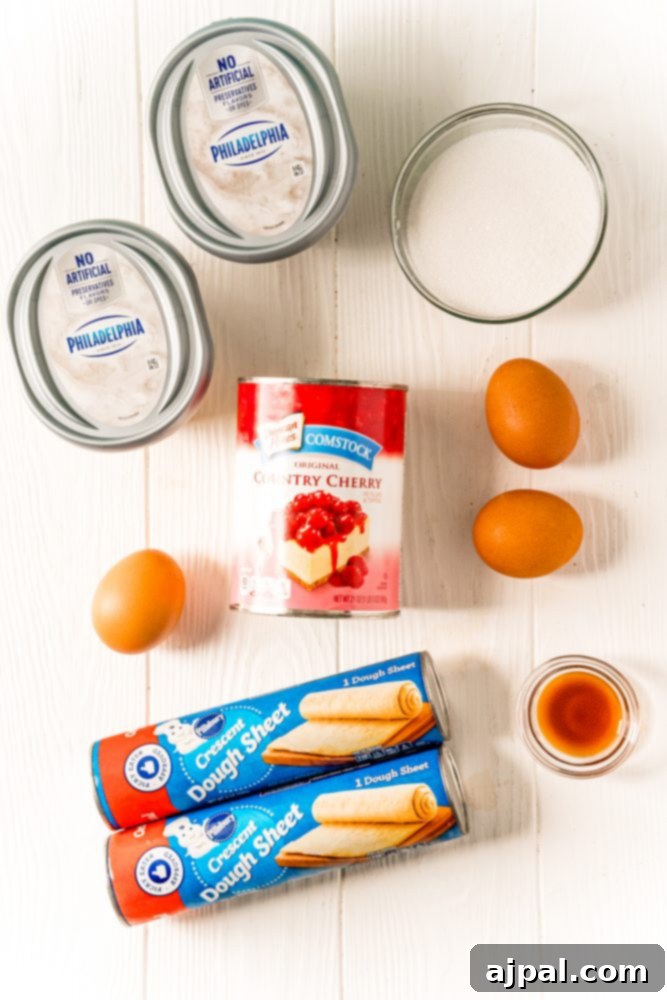 Cream cheese, cherries, pastry, eggs, sugar, vanilla on a table
