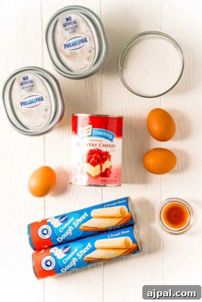 cream cheese, cherries, pastry, eggs, sugar, vanilla on a table