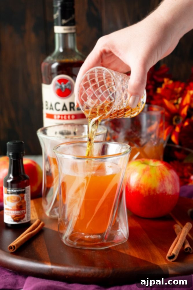 rum pouring into cider
