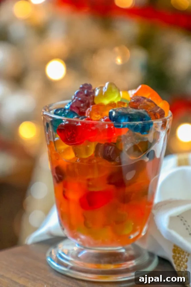 Negroni gummy bears capturing the bittersweet essence of the cocktail, served elegantly in a glass.
