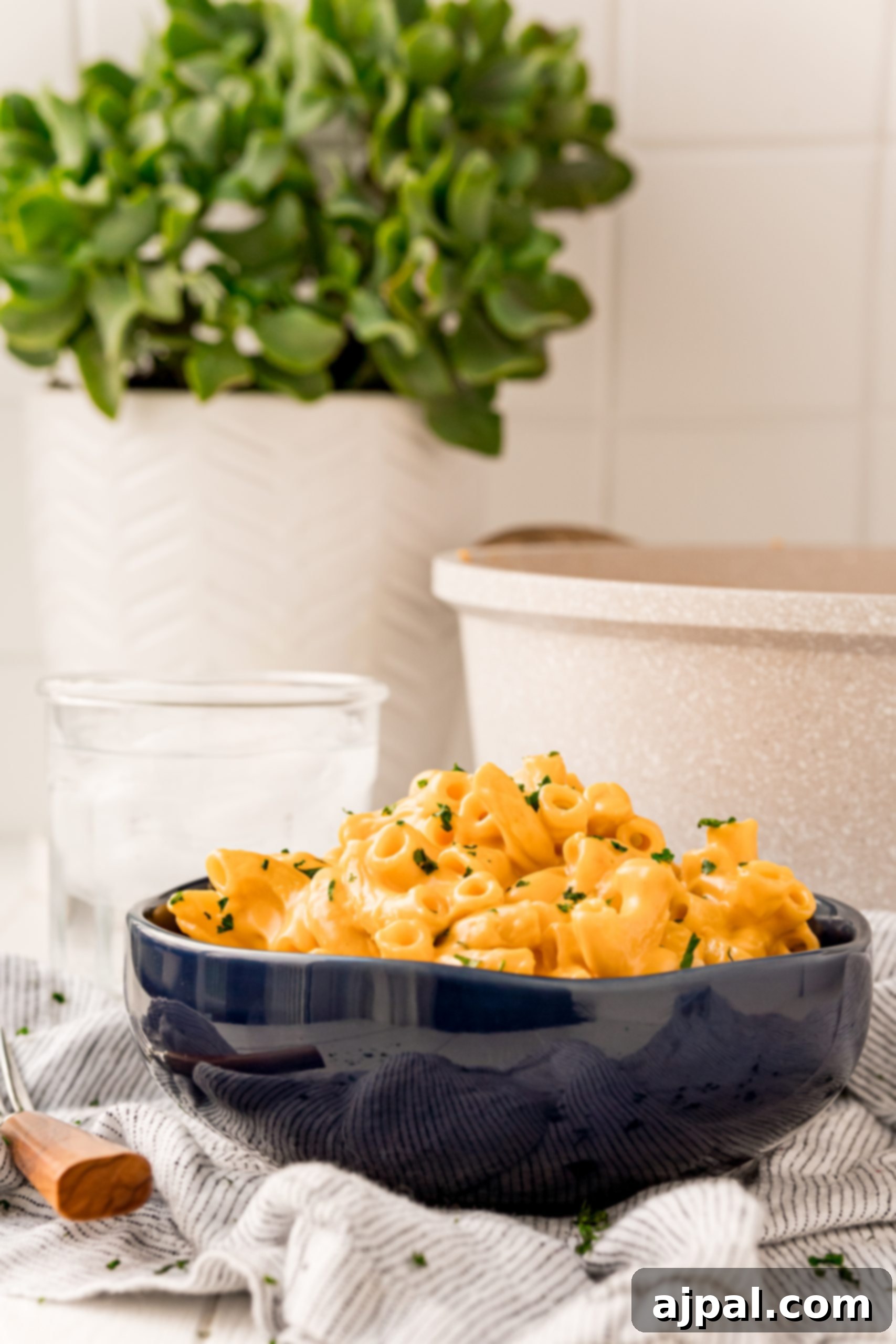 Cheesy macaroni and cheese featuring pub cheese in a bowl.