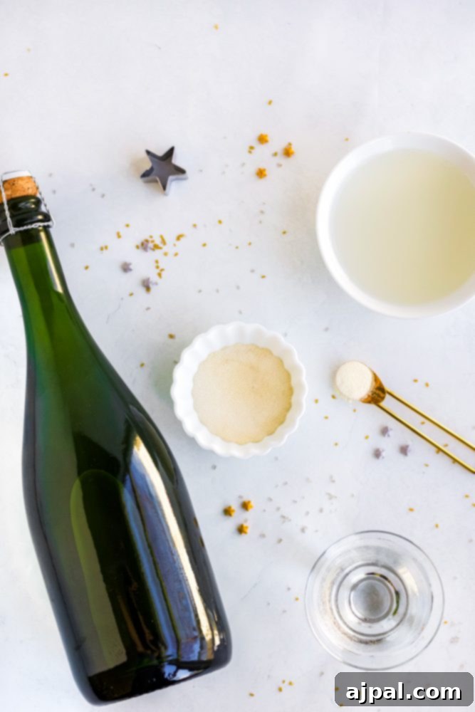 Ingredients laid out for Champagne Jello Shots: a bottle of sparkling wine, sugar, and lemon jello packets.
