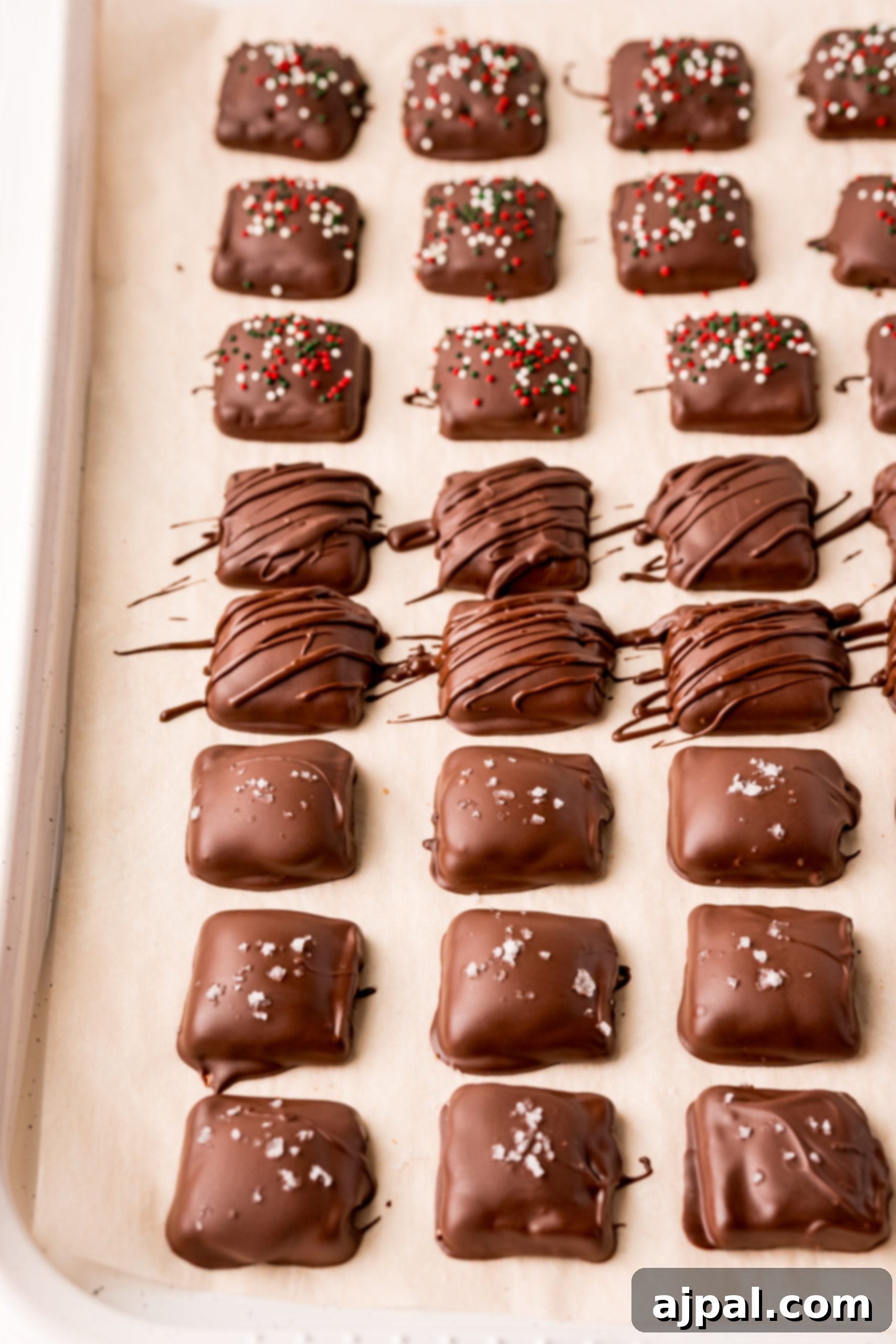 Decadent Millionaire Shortbread Bites Made Easy 15 Chocolate-covered candy canes alongside tempting Shortcut Millionaire Bars, arranged on a baking sheet for a delightful sweet treat.