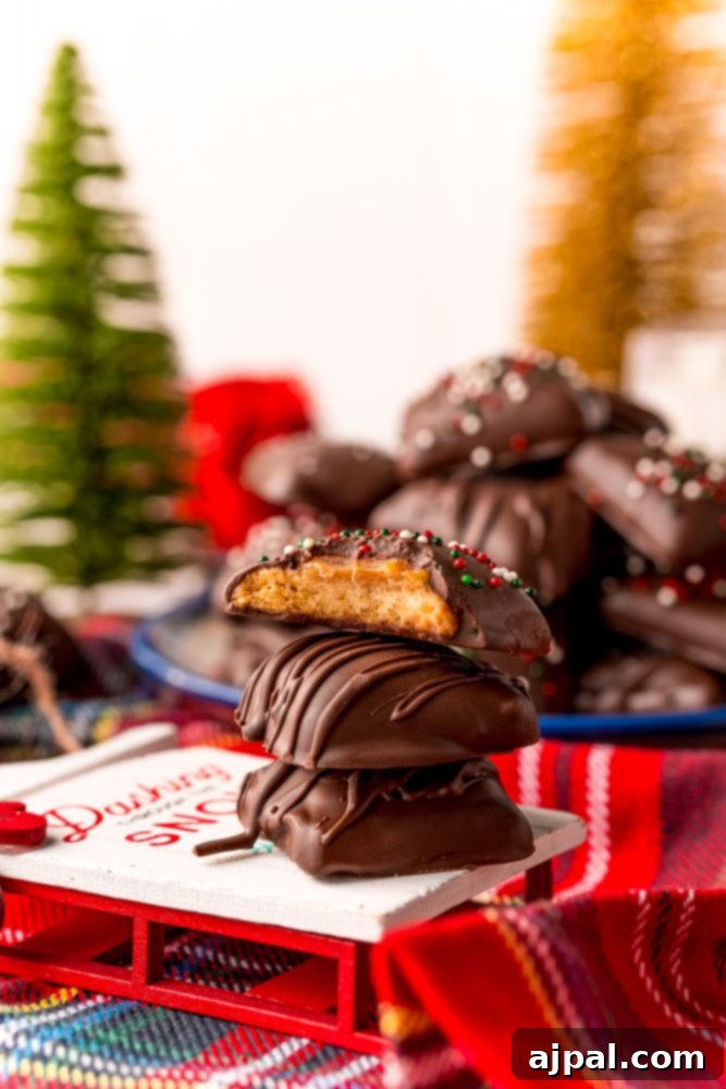 Decadent Millionaire Shortbread Bites Made Easy 6 A beautifully arranged tray of chocolate-covered donuts, perfect for a sweet indulgence or festive gathering.