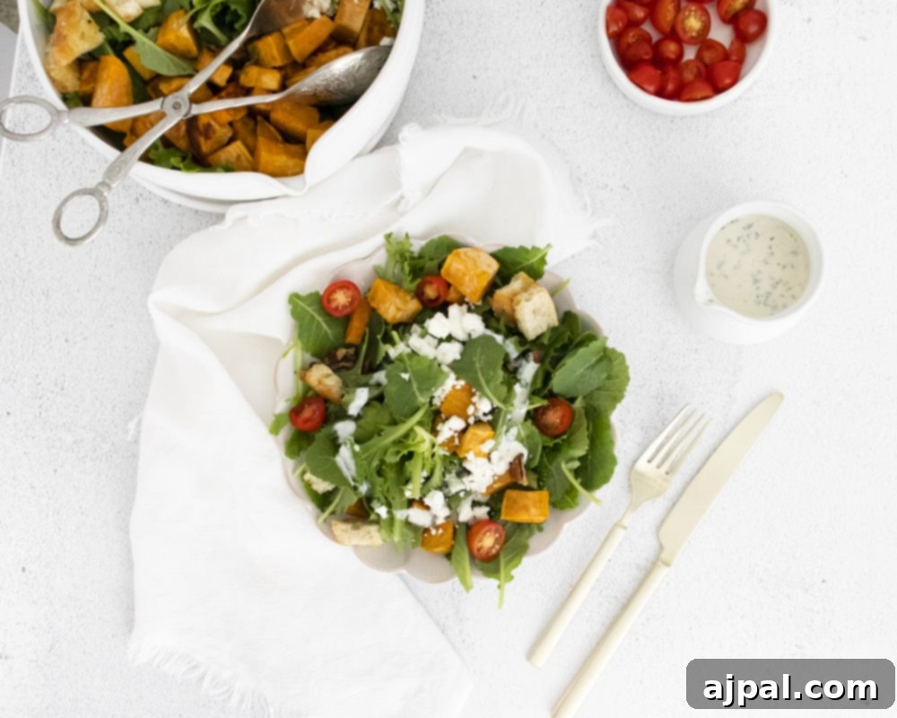 Close-up of a delightful Roasted Sweet Potato and Goat Cheese Salad, highlighting the rich textures and vibrant colors of the ingredients.