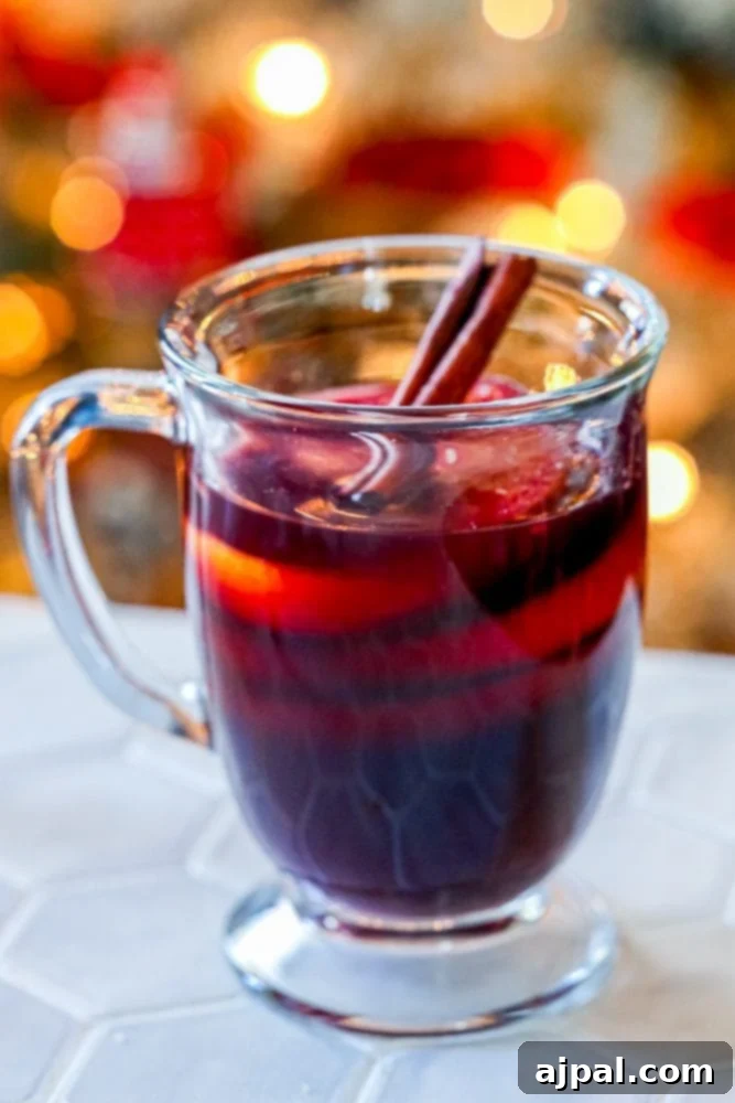 picture of rum punch in a glass mug on a table