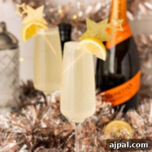 Effortless Champagne Fizz 13 Easy Champagne Cocktail with Lemon Slices and Tinsel.