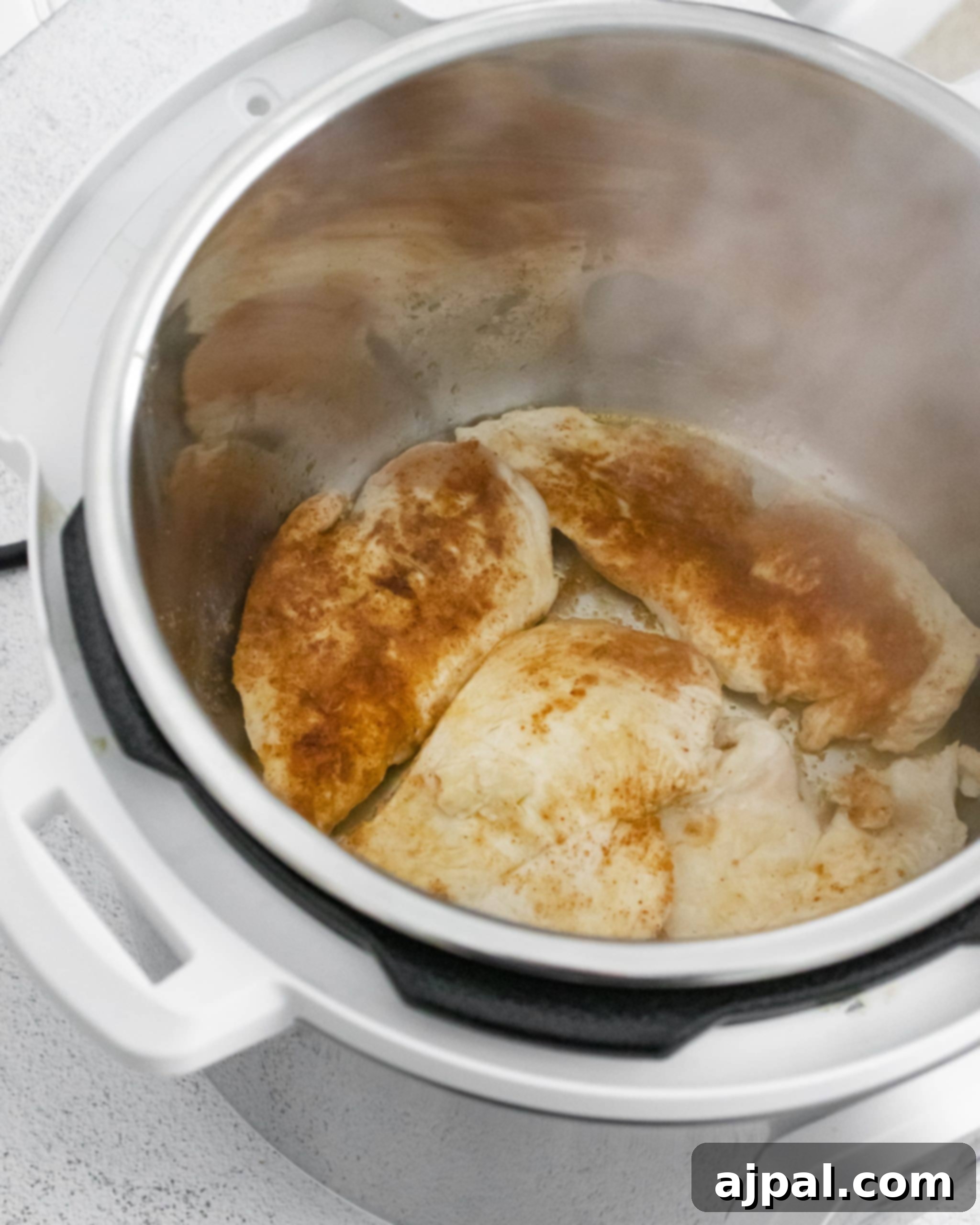 Instant Pot Chicken Fajita Bowls Recipe, expertly cooked on a stovetop, showcasing a delicious and simple preparation method for a healthy meal.