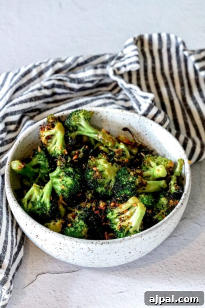 Crispy Air Fried Broccoli 3 Close-up of perfectly air-fried broccoli florets with crispy edges, ready to be served.