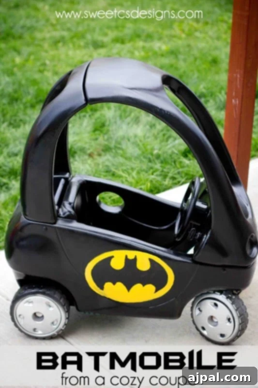 picture of cozy coupe painted to look like a batmobile
