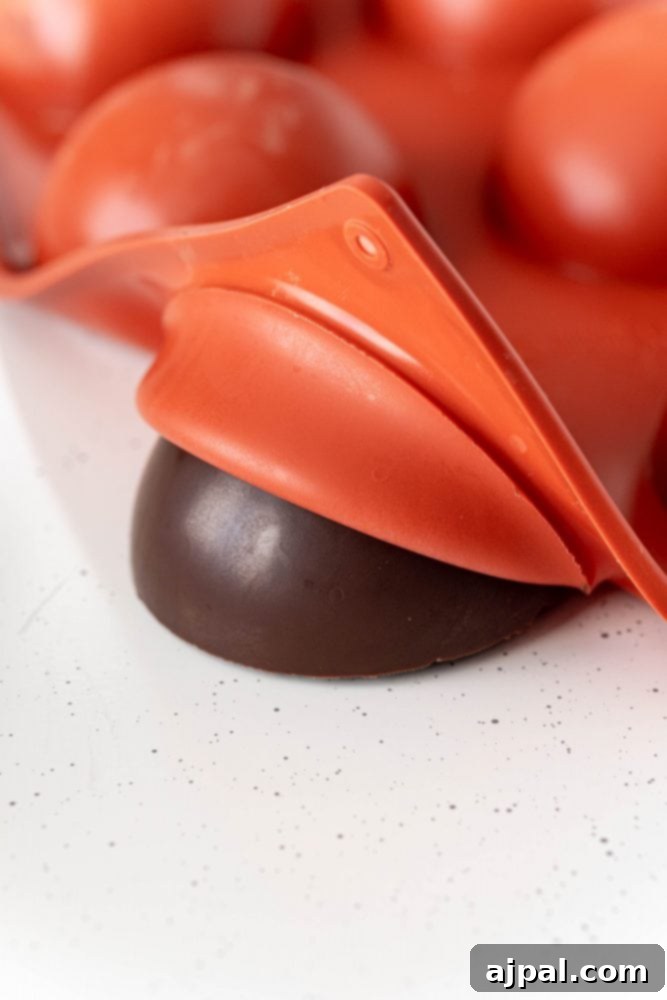 Berry Burst Hot Cocoa Spheres 11 A raspberry hot chocolate bomb in the shape of a perfect sphere.