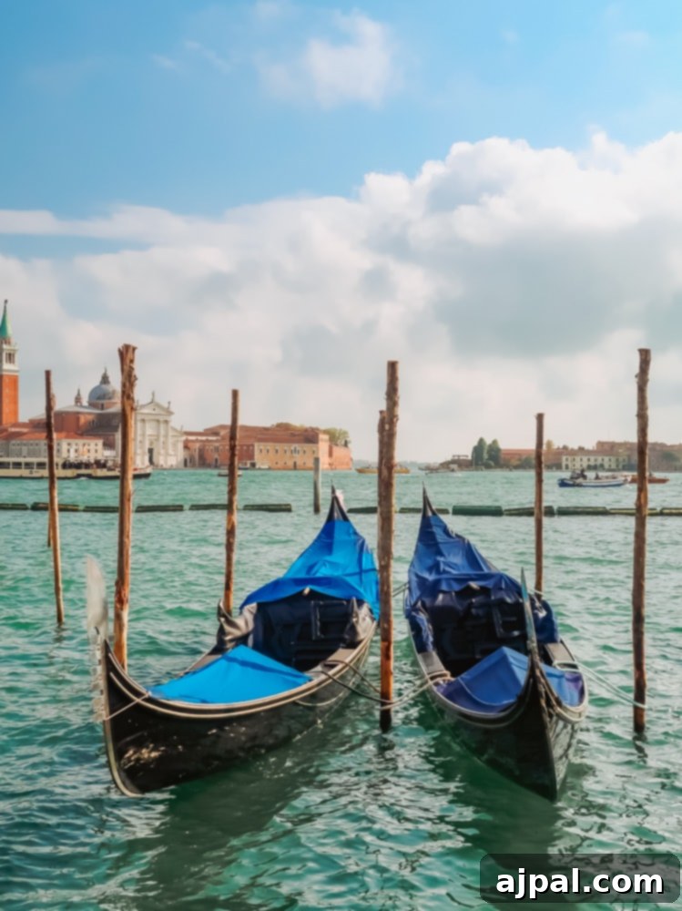 Gondolas gracefully navigating the Grand Canal in Venice, reflecting the historic architecture.