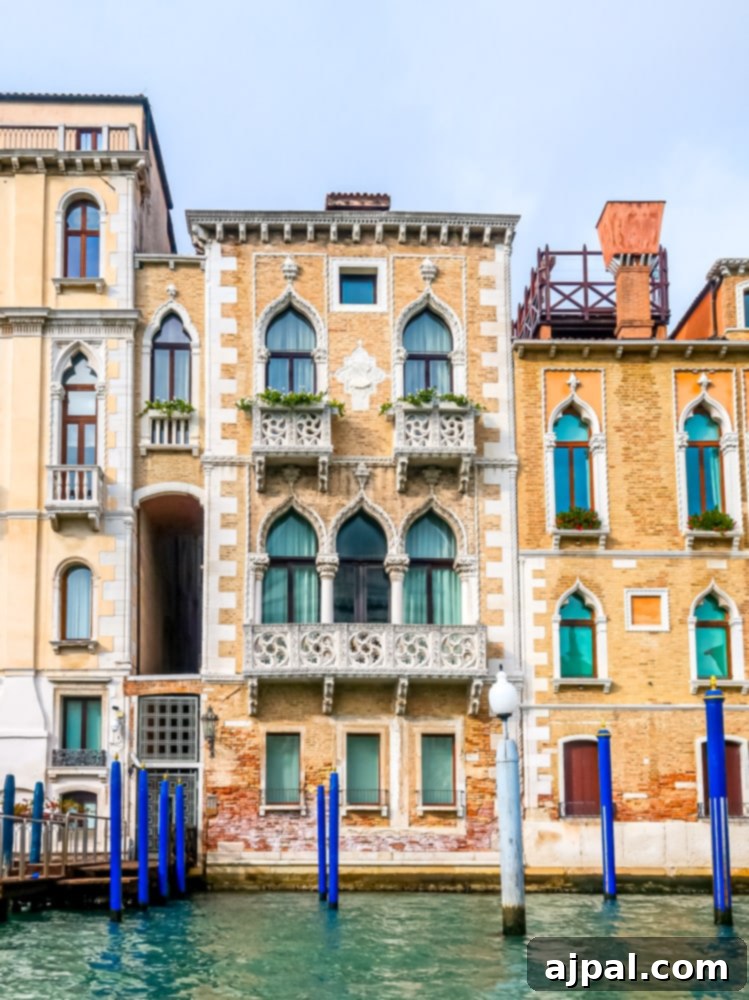 Colorful houses lining the Grand Canal in Venice, showcasing the city's unique architectural charm.