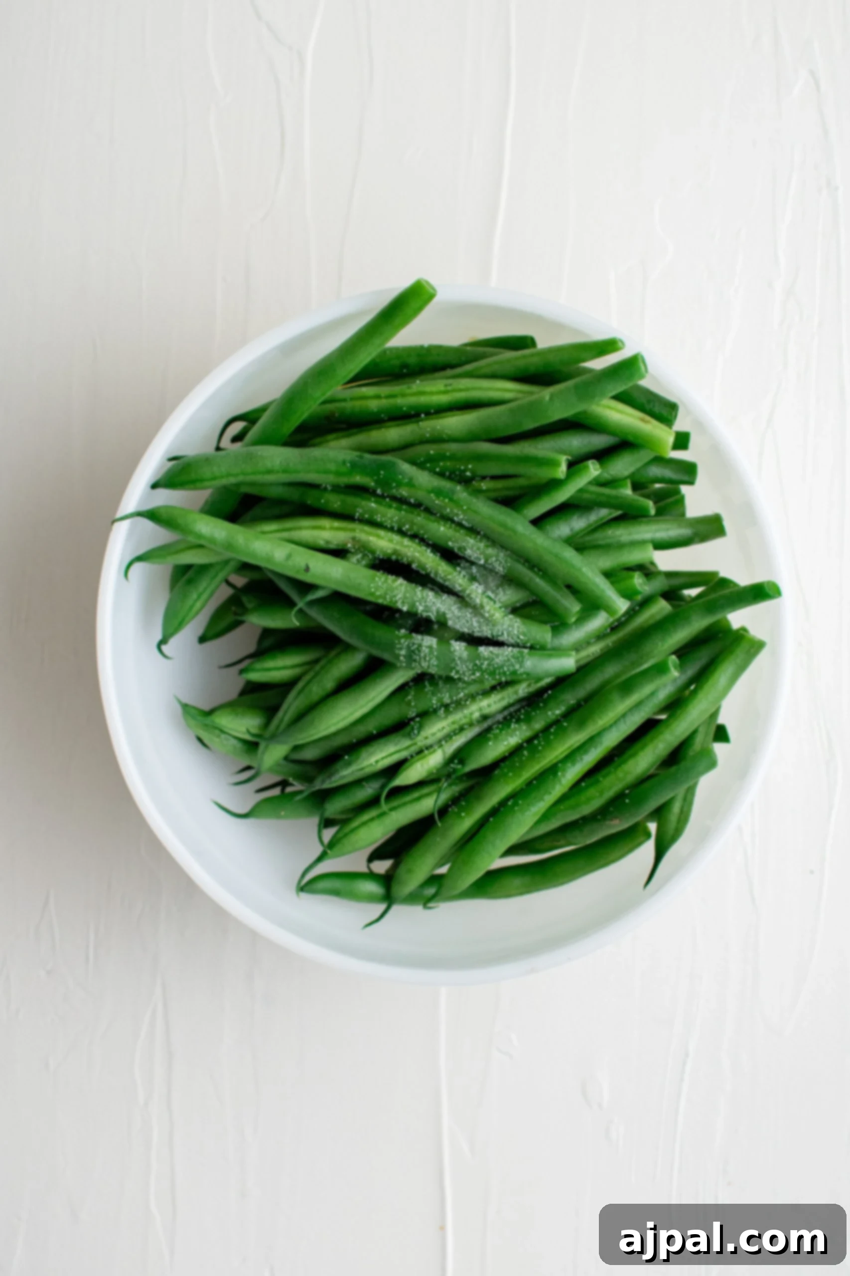 Savory Herb Roasted Green Beans and Potatoes 11 Keywords: green beans, white bowl