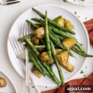 Savory Herb Roasted Green Beans and Potatoes 14 Green beans and potatoes, herb roasted.