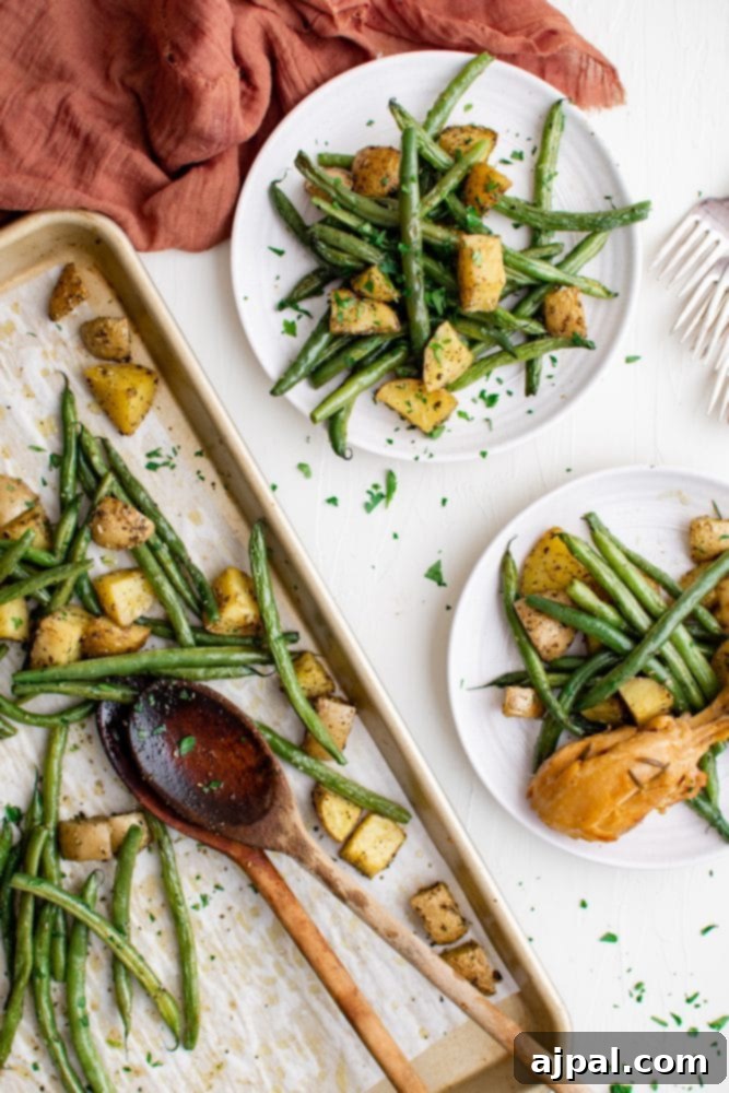 Savory Herb Roasted Green Beans and Potatoes 6 sheet pan with green beans and potatoes roasted on it