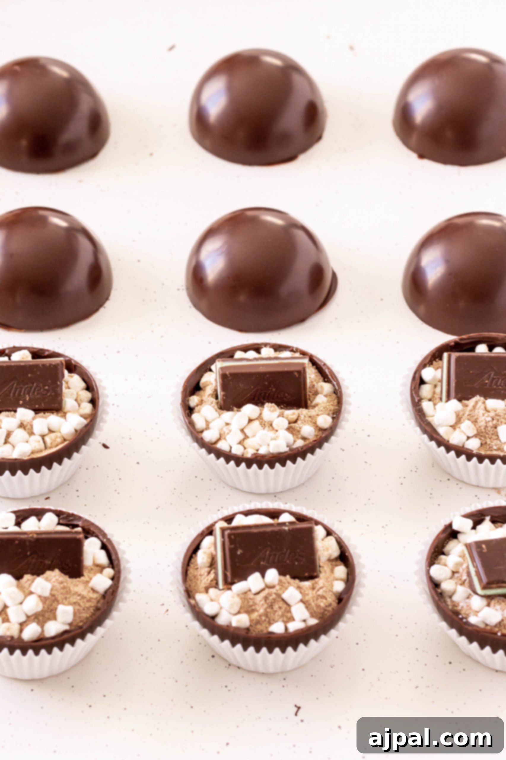 Irresistible Mint Hot Chocolate Bombs 9 chocolate half spheres filled with hot chocolate powder, marshmallows, and andes mint.