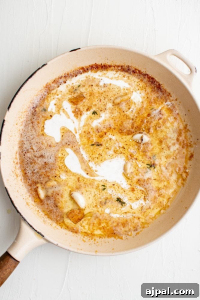 Creamy skillet chicken with a rich, bubbling sauce.