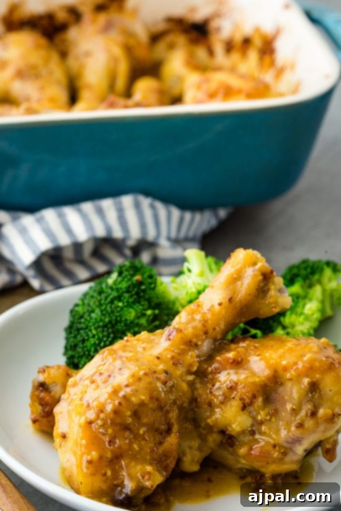 Glazed Honey Mustard Chicken Drumsticks 2 Crispy honey mustard chicken drumsticks plated elegantly