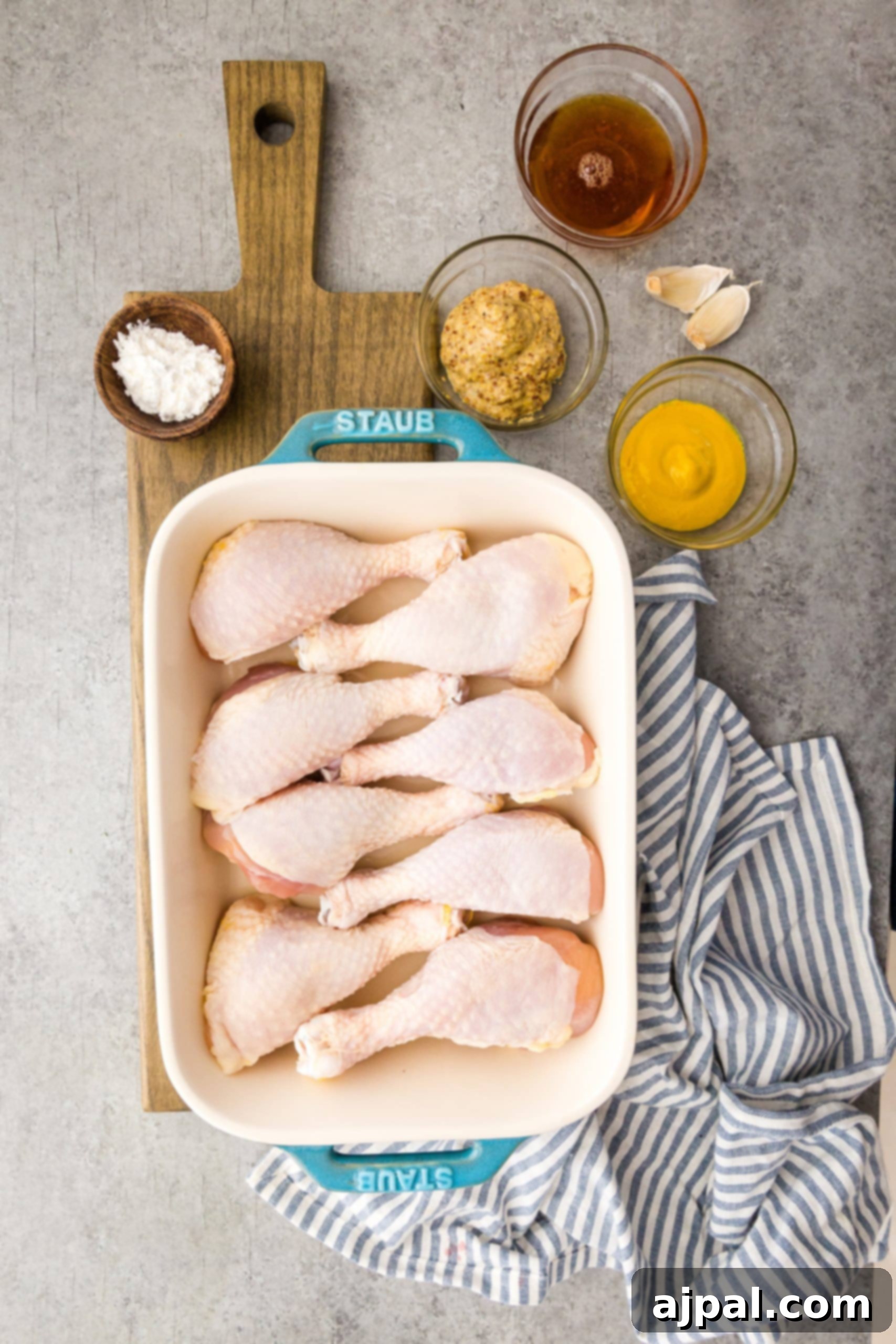 Glazed Honey Mustard Chicken Drumsticks 5 Honey Mustard Baked Chicken Drumsticks Recipe displayed on a table.