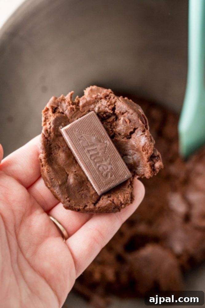 Andes Mint Lava Cookies 8 chocolate cookie dough flat with an andes mint on it